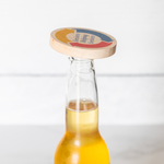 SHS_Magnetic_Wooden_Bottle_Opener_Bottle_Use_Mockup.png