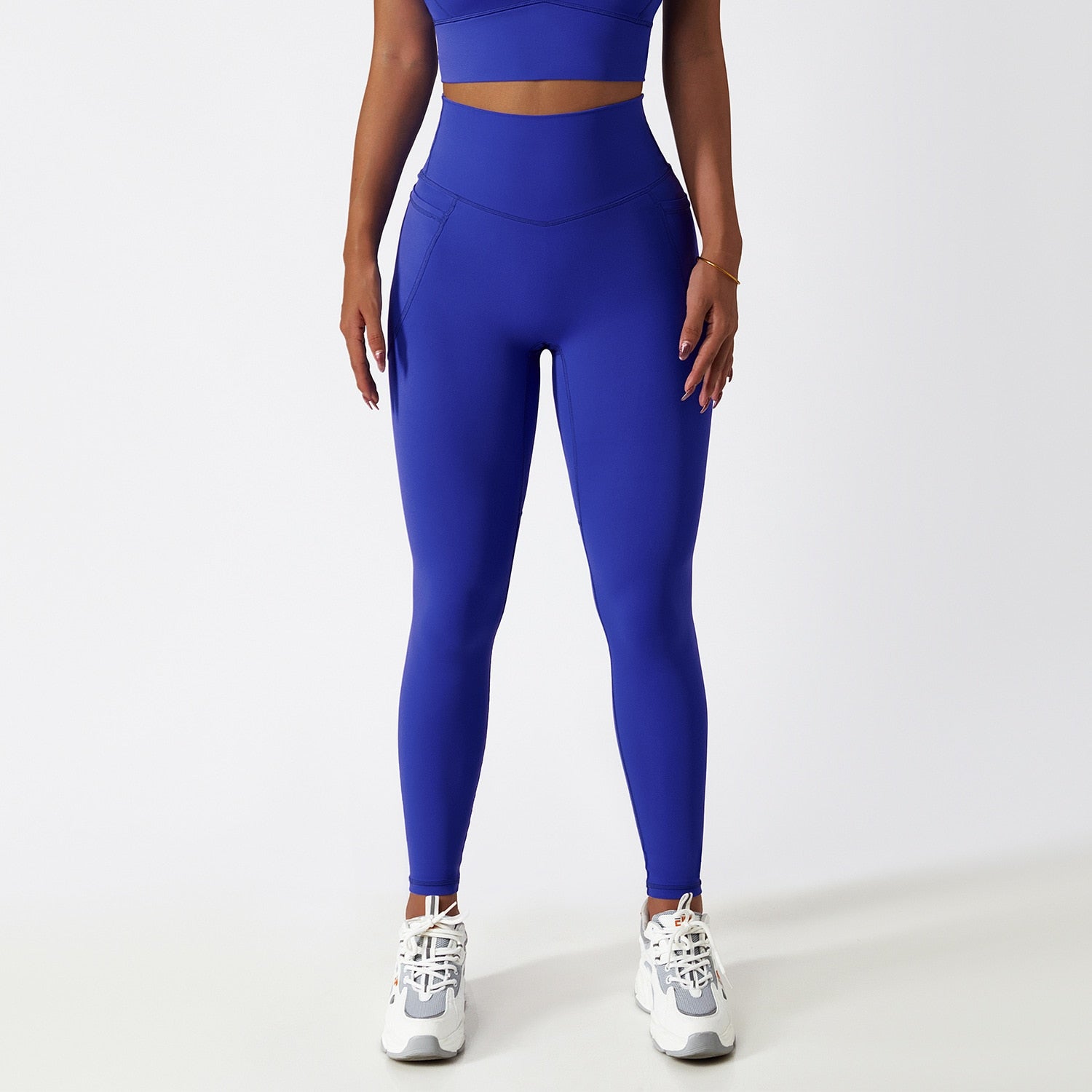 Women's Solid Blue Seamless High Waisted Yoga Leggings With Pockets
