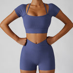 Women's Two Piece Purple Ribbed Modern Short Sleeve Yoga Top High Waisted Shorts Workout Set